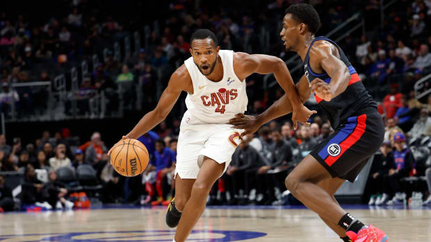 Mar 1, 2024; Detroit, Michigan, USA; Cleveland Cavaliers forward Evan Mobley (4) dribbles against Detroit Pistons center Jalen Duren (0) in the first half at Little Caesars Arena. Mandatory Credit: Rick Osentoski-USA TODAY Sports
